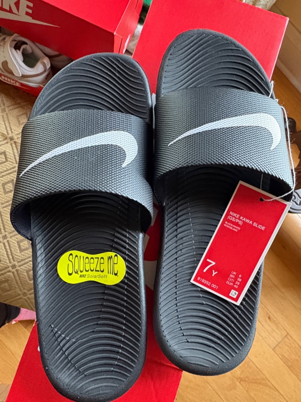 Nike Black Slide Sandals with White Swoosh